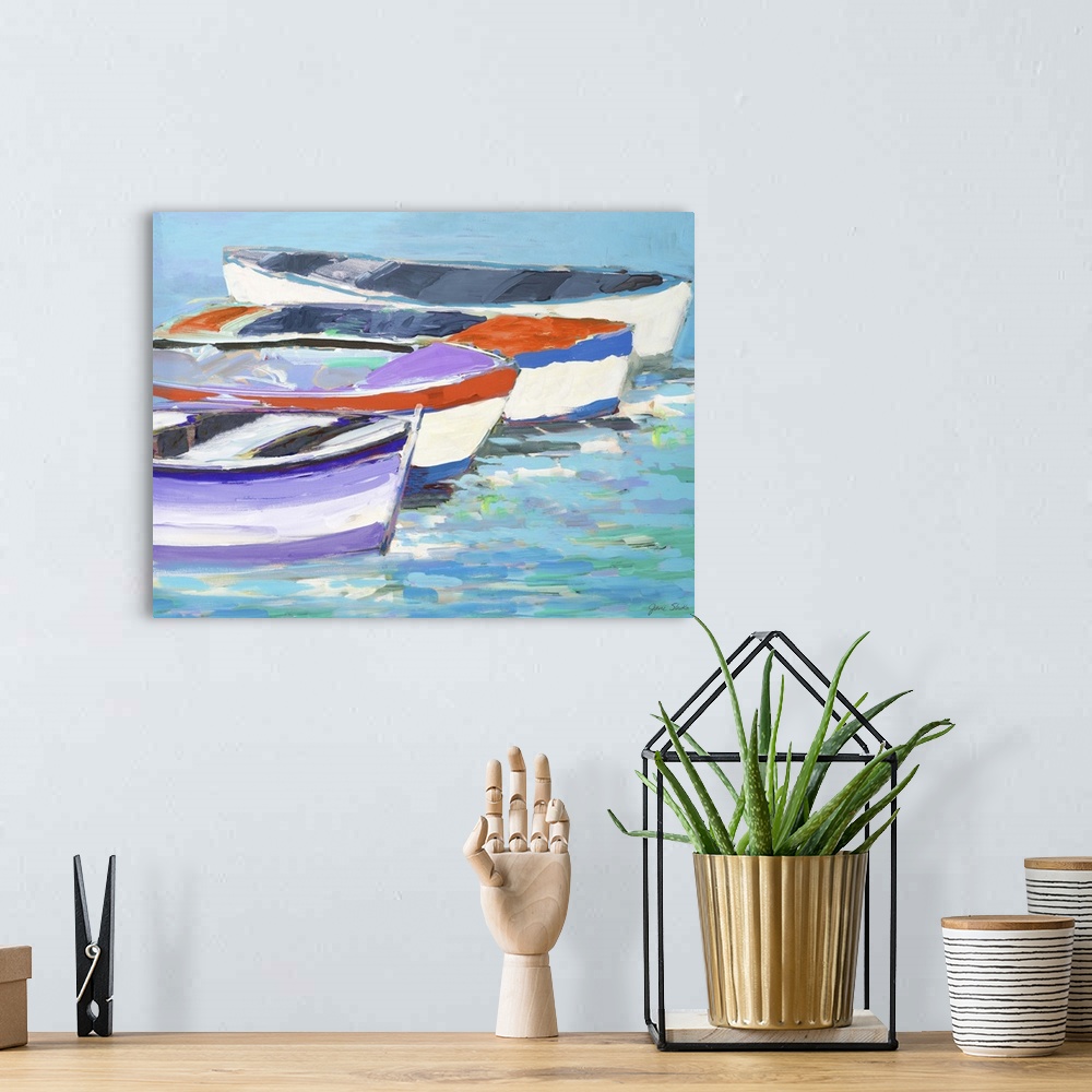 A bohemian room featuring Painting of four boats in a row on the water.