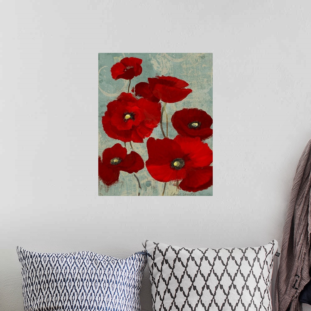 A bohemian room featuring Mixed Media artwork of a bunch of poppy blooms with brilliant red petals on thin stems on a light...