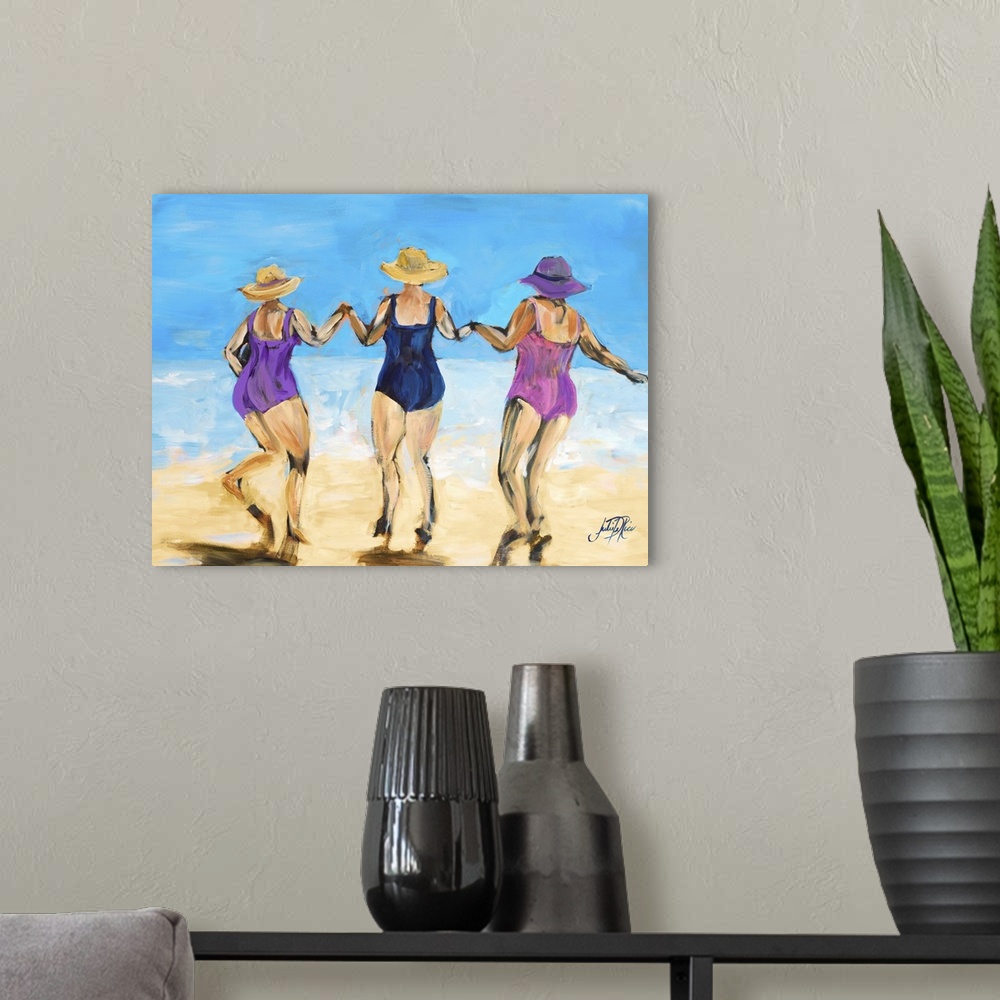A modern room featuring Painting of three ladies in hats and swimsuits playing on the beach.