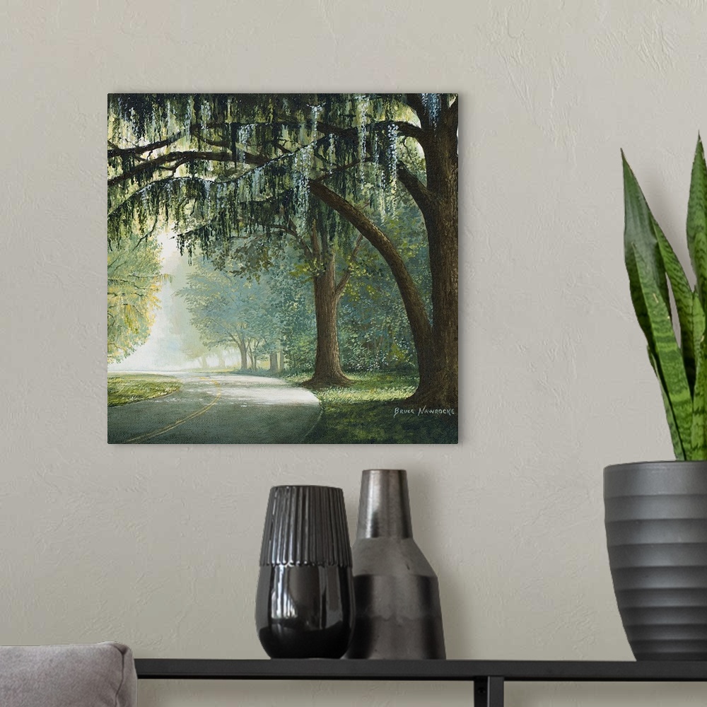 A modern room featuring Contemporary painting of a road passing through a shady forest.