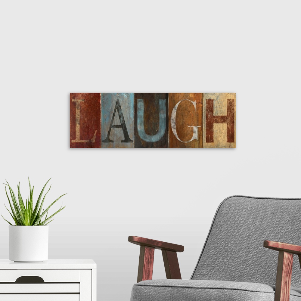A modern room featuring Horizontal home art docor on a big canvas of the word "LAUGH" , each letter is a different color ...