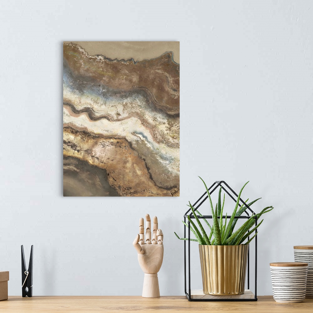 A bohemian room featuring Contemporary abstract artwork resembling sedimentary rock layers.