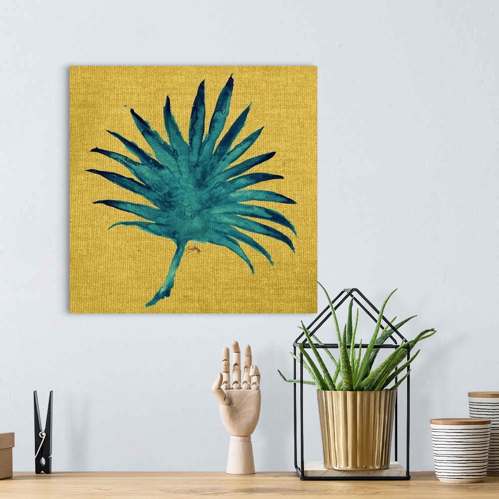 A bohemian room featuring Square painting of a teal palm leaf on a yellow burlap background.