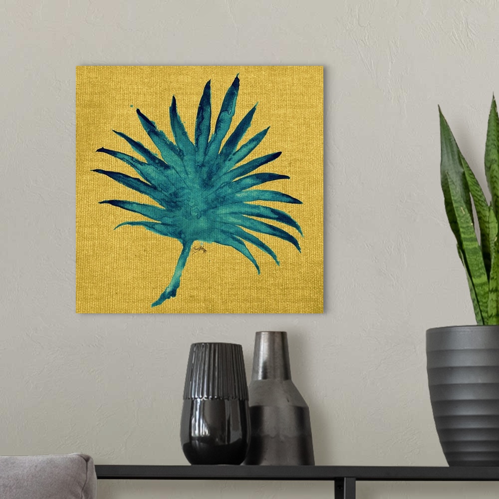 A modern room featuring Square painting of a teal palm leaf on a yellow burlap background.