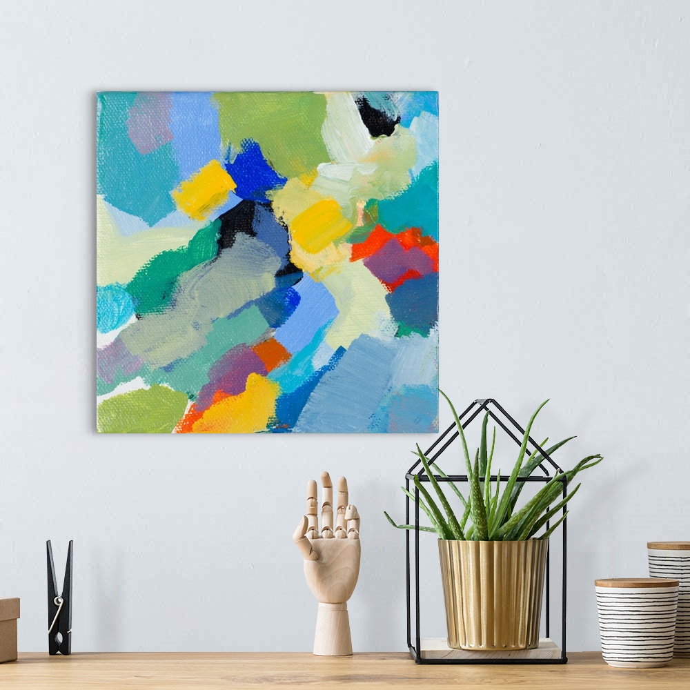 A bohemian room featuring This abstract artwork features bright blocks of color scattered in a energetic manner.