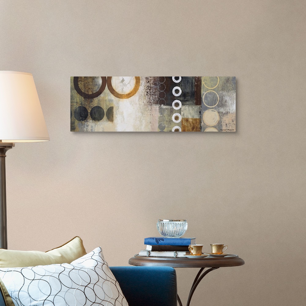A traditional room featuring Panoramic abstract painting of different sized circles over top of a grungy background.
