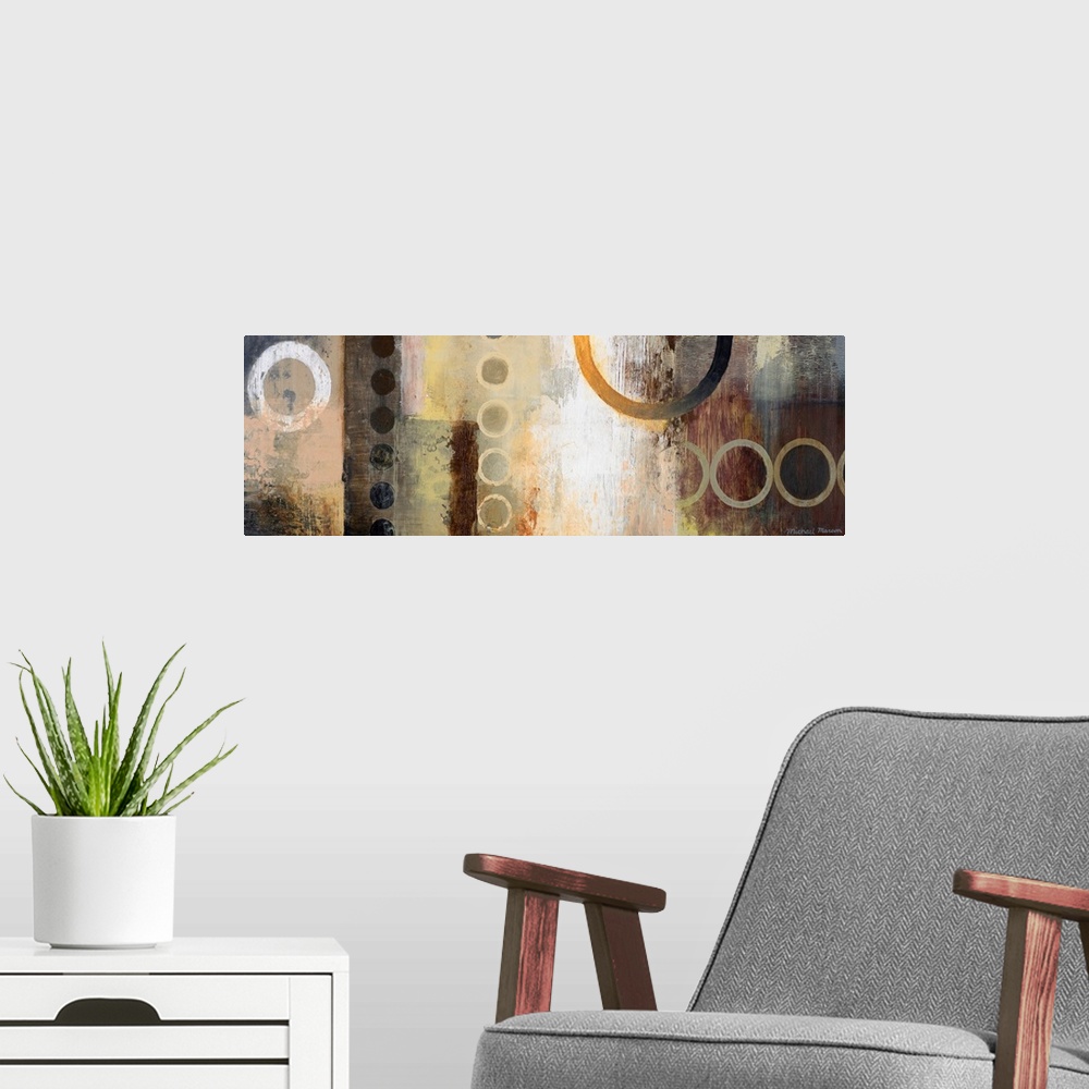 A modern room featuring Abstract artwork featuring multiple circular shapes in mostly neutral tones.