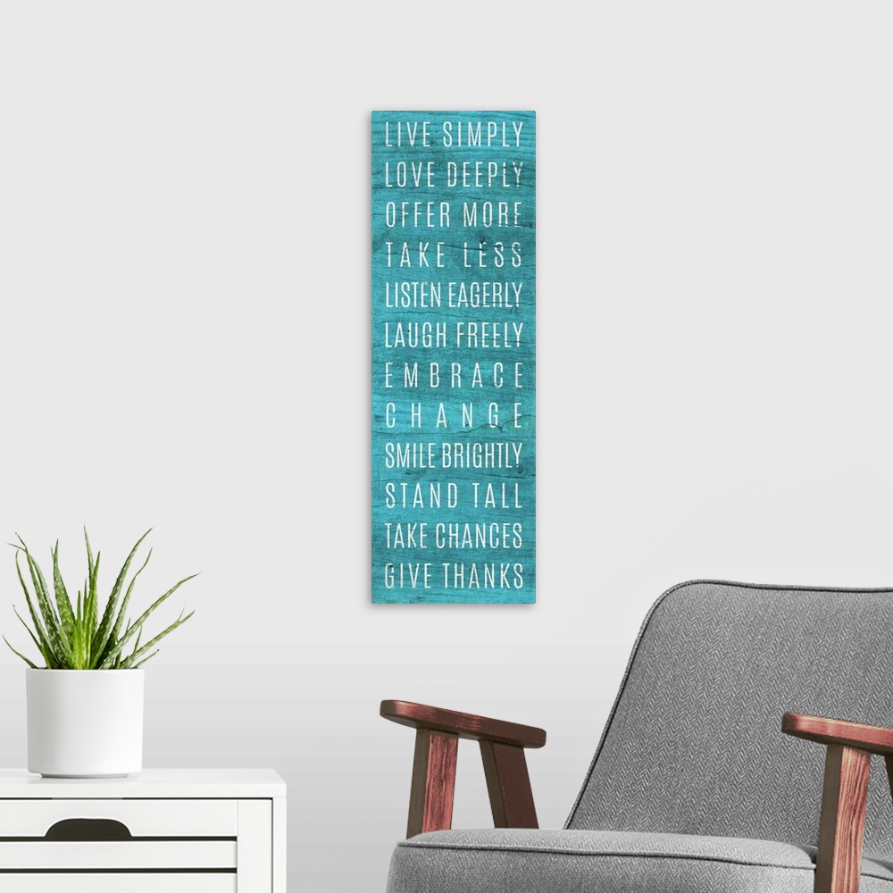 A modern room featuring A list of "rules" for living well in white lettering on teal blue.