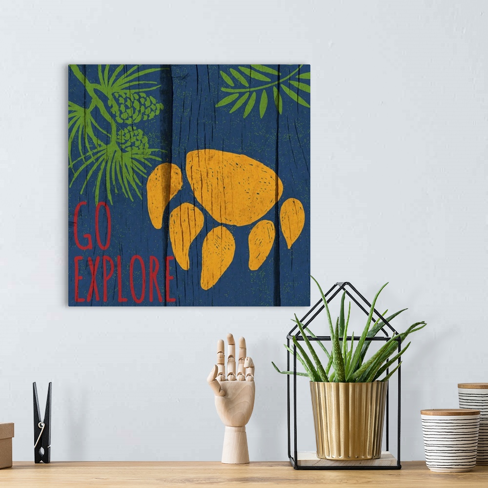 A bohemian room featuring Brightly colored image of a bear's pawprint with a wooden board texture.