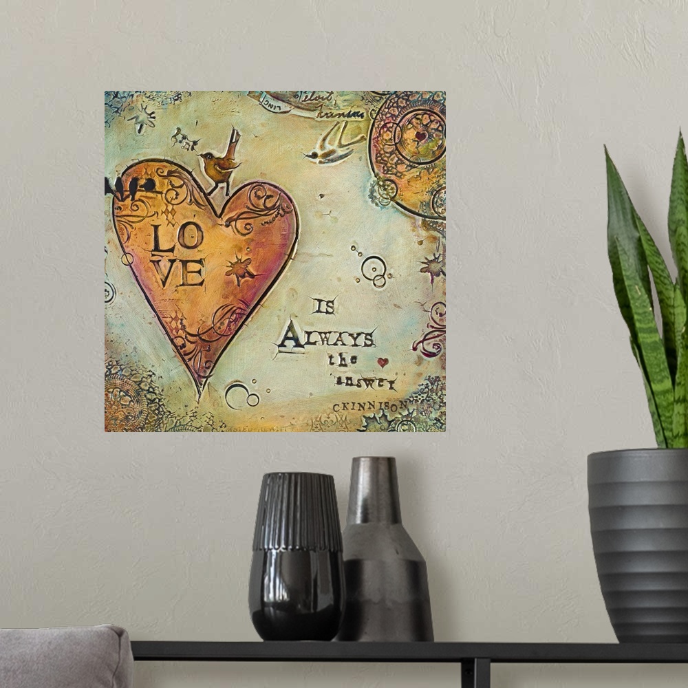 A modern room featuring A sentiment about love over a painting of a heart with curling shapes.
