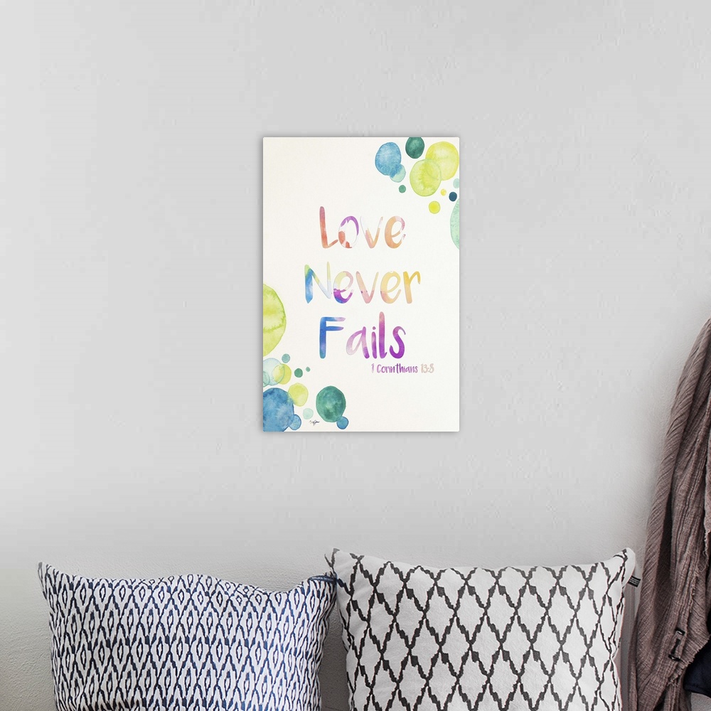 A bohemian room featuring "Love Never Fails" 1 Corinthians 13:8 created with watercolor on a white background with bubbles ...