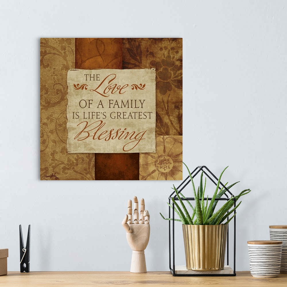 A bohemian room featuring Inspirational artwork of a quote about family surrounded by different designs on neutral color bl...