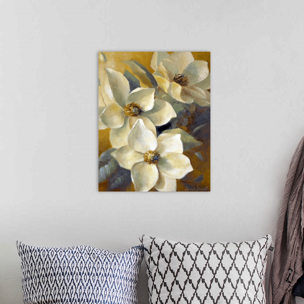 A bohemian room featuring Large, portrait floral painting of several blooming magnolias and their leaves, glowing in the ev...