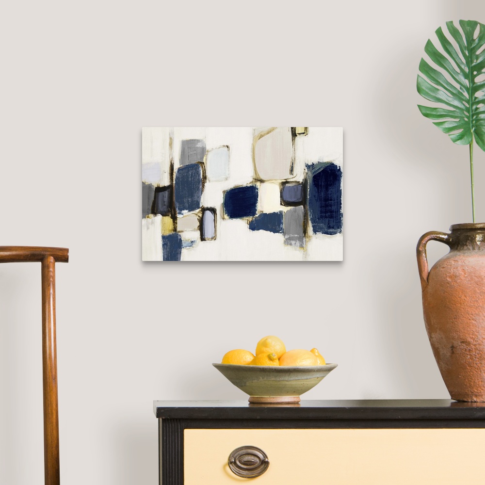 A traditional room featuring Contemporary abstract art with dark blue shapes on light grey.