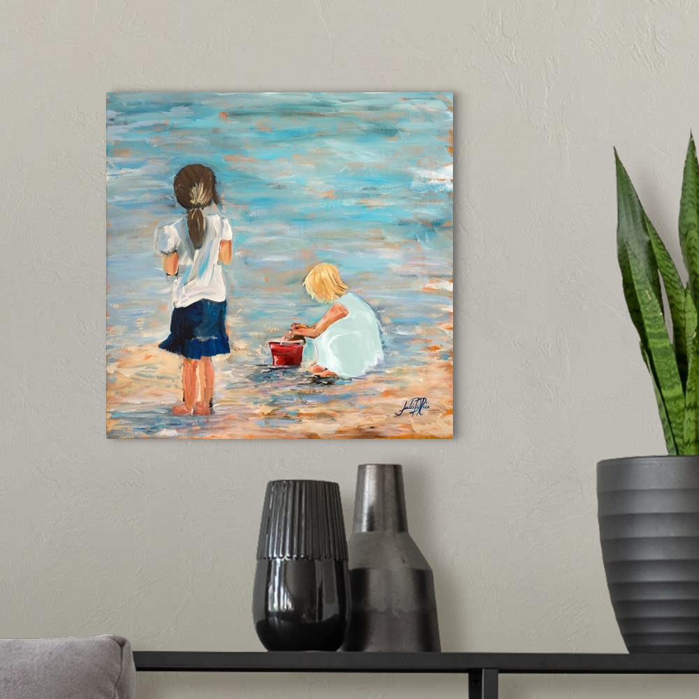 A modern room featuring Contemporary artwork featuring two children playing on the shore.