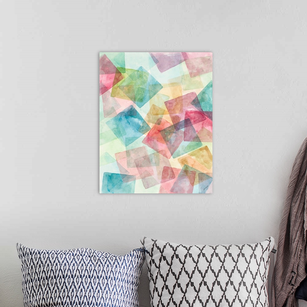 A bohemian room featuring A contemporary watercolor painting of colorful geometric square shapes merging together.