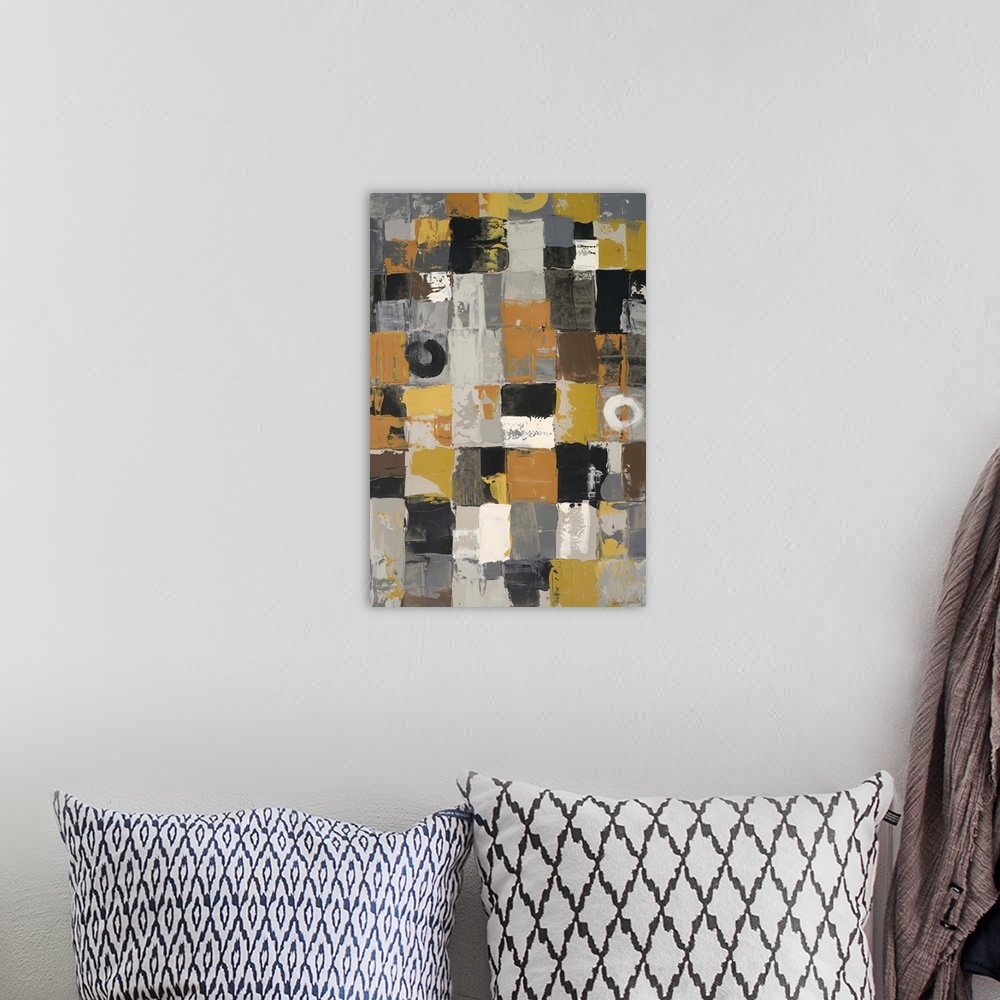 A bohemian room featuring Urban abstract in orange and grey shades, made of patchwork squares.