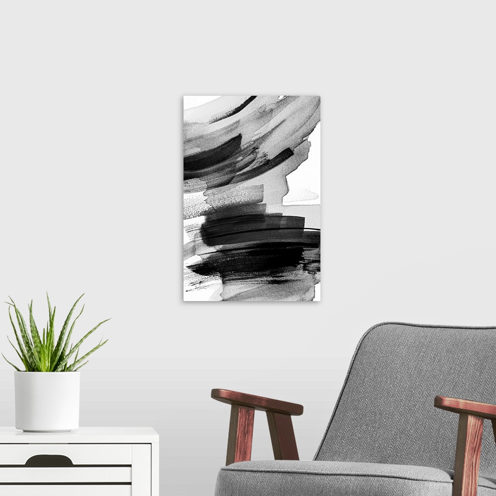 A modern room featuring This abstract artwork features layers of black brush strokes in expressive arcs.