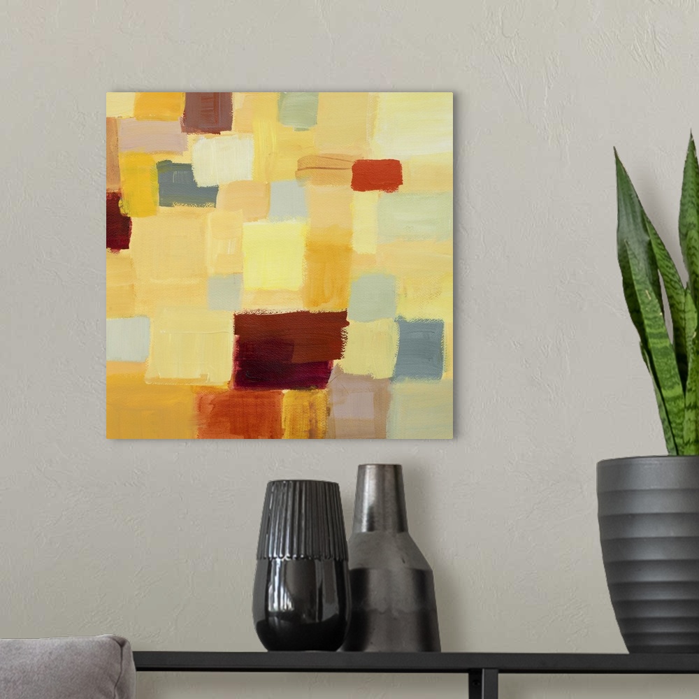 A modern room featuring Abstract painting made of colorful square shapes.
