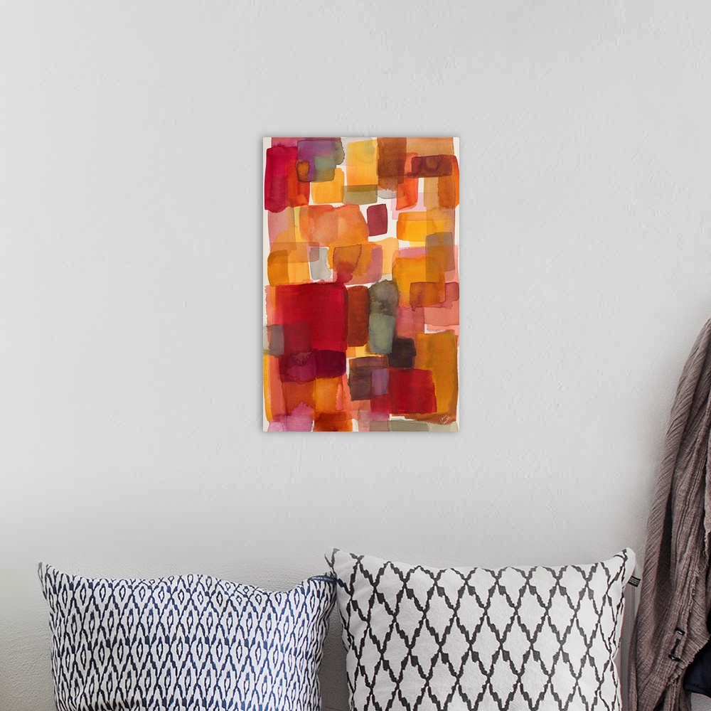 A bohemian room featuring A contemporary abstract watercolor painting with warm toned boxes layered throughout.