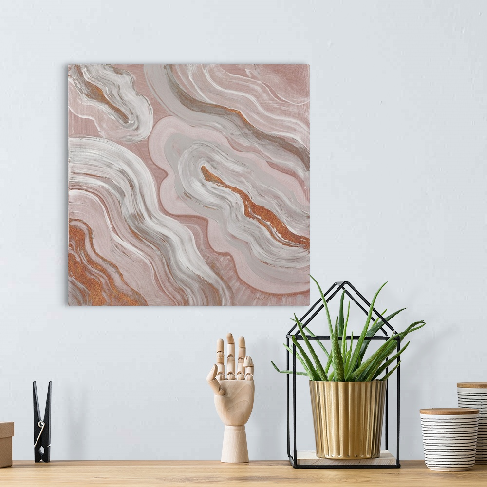 A bohemian room featuring Square abstract painting of agate in dull shades of orange with gray, white, and a sparkly orange.