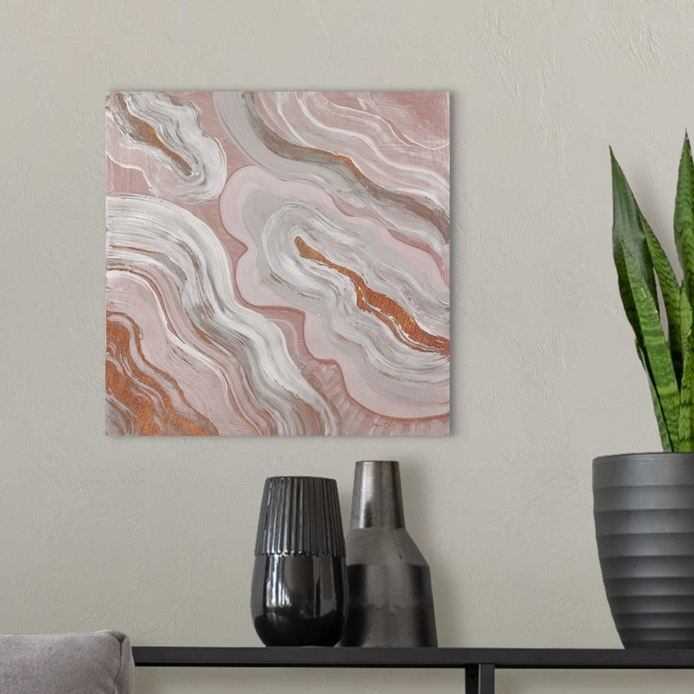 A modern room featuring Square abstract painting of agate in dull shades of orange with gray, white, and a sparkly orange.
