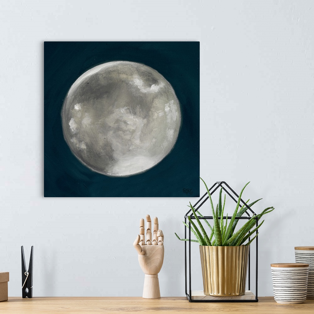 A bohemian room featuring Square painting of a full moon on a deep blue background.