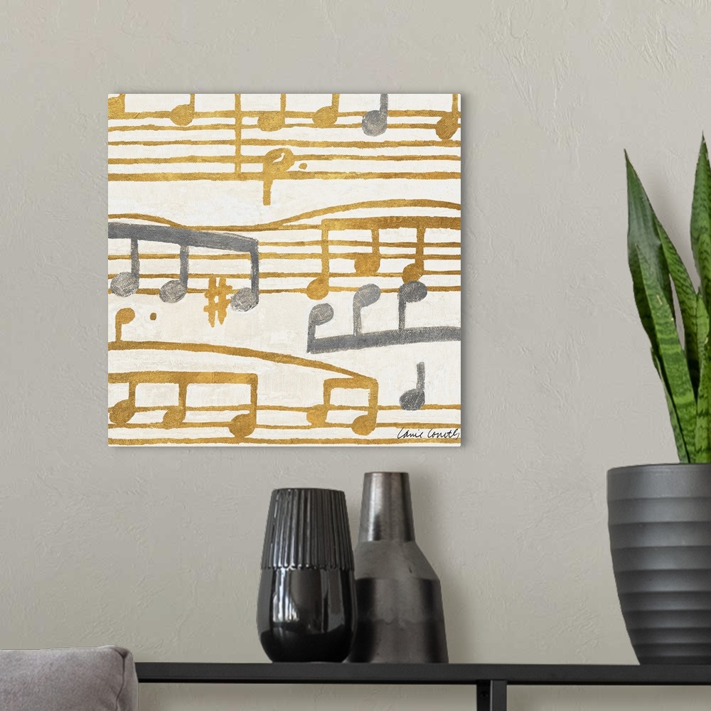 A modern room featuring Square painting of gold and silver music stanzas.