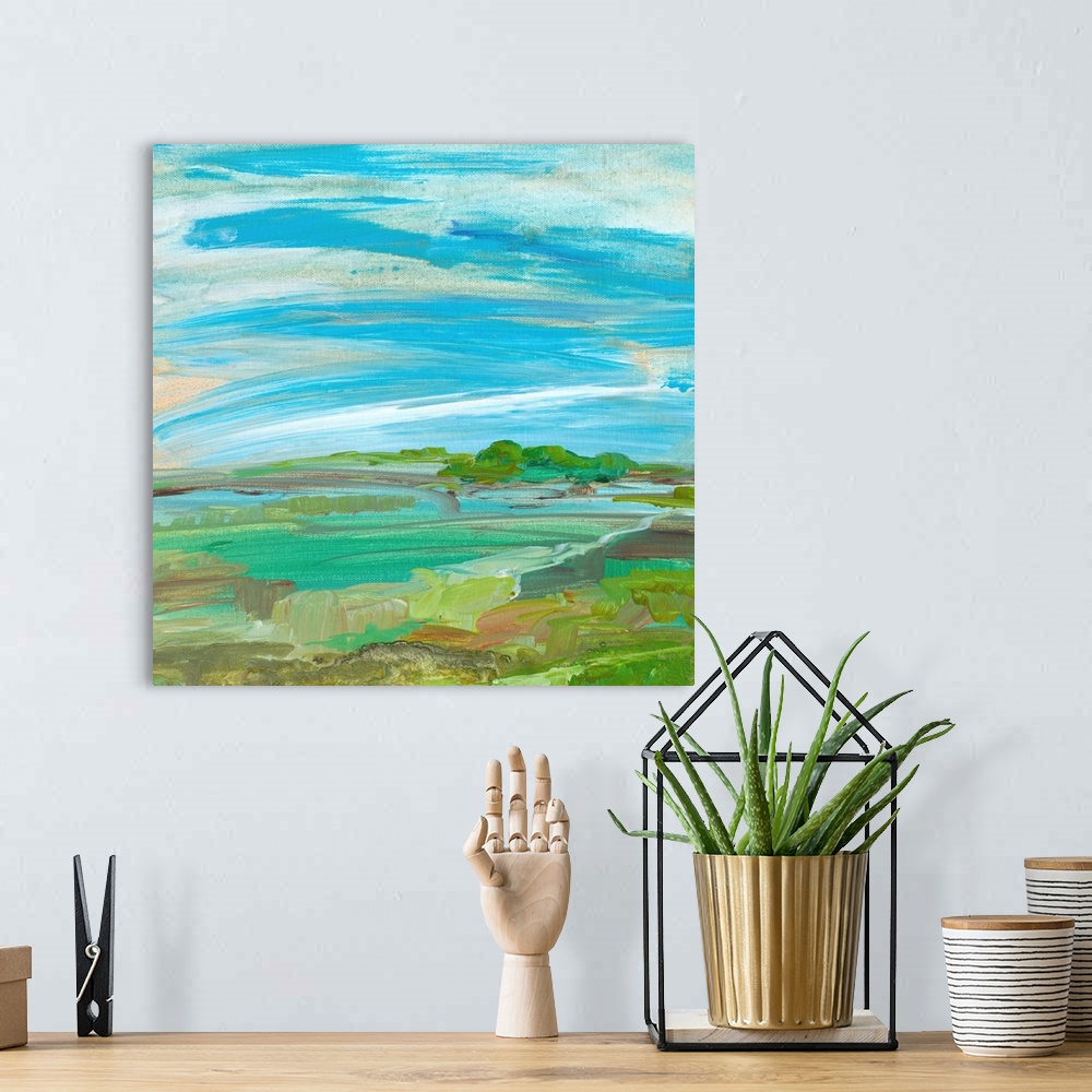A bohemian room featuring Contemporary painting of a verdant landscape under a blue sky.