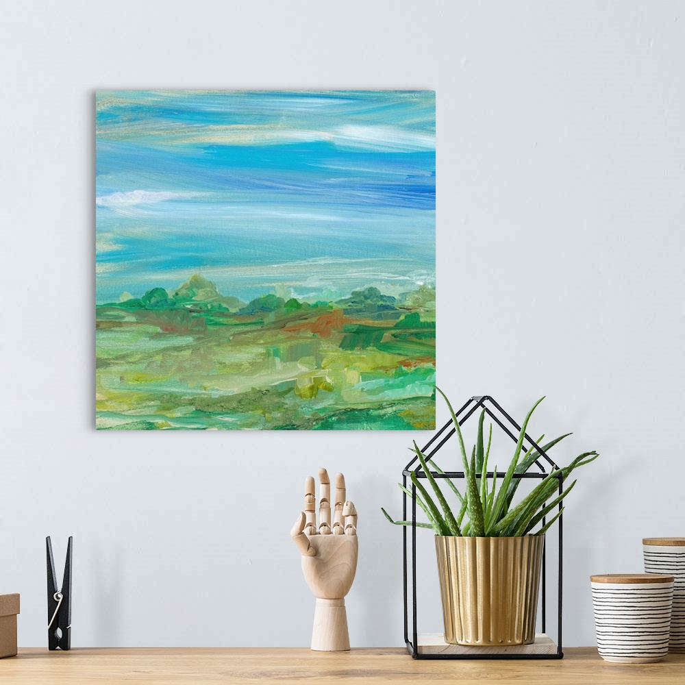 A bohemian room featuring Contemporary painting of a verdant landscape under a blue sky.