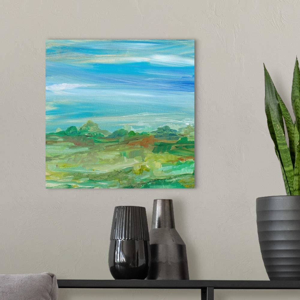 A modern room featuring Contemporary painting of a verdant landscape under a blue sky.