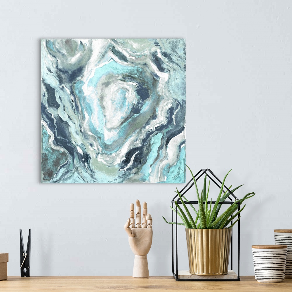 A bohemian room featuring Square abstract painting of quartz showing the agate in shades of blue and white.