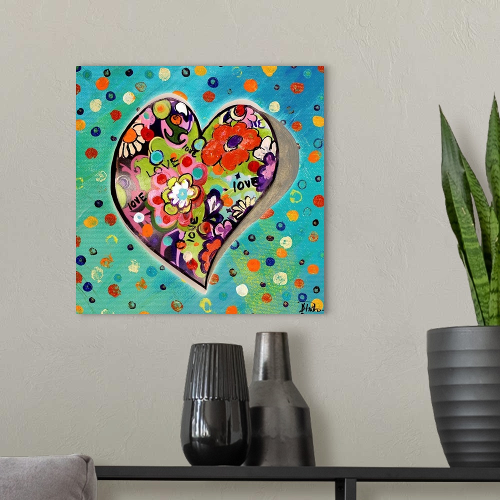 A modern room featuring Heart shape filled with bright flowers on a colorful dotted background.