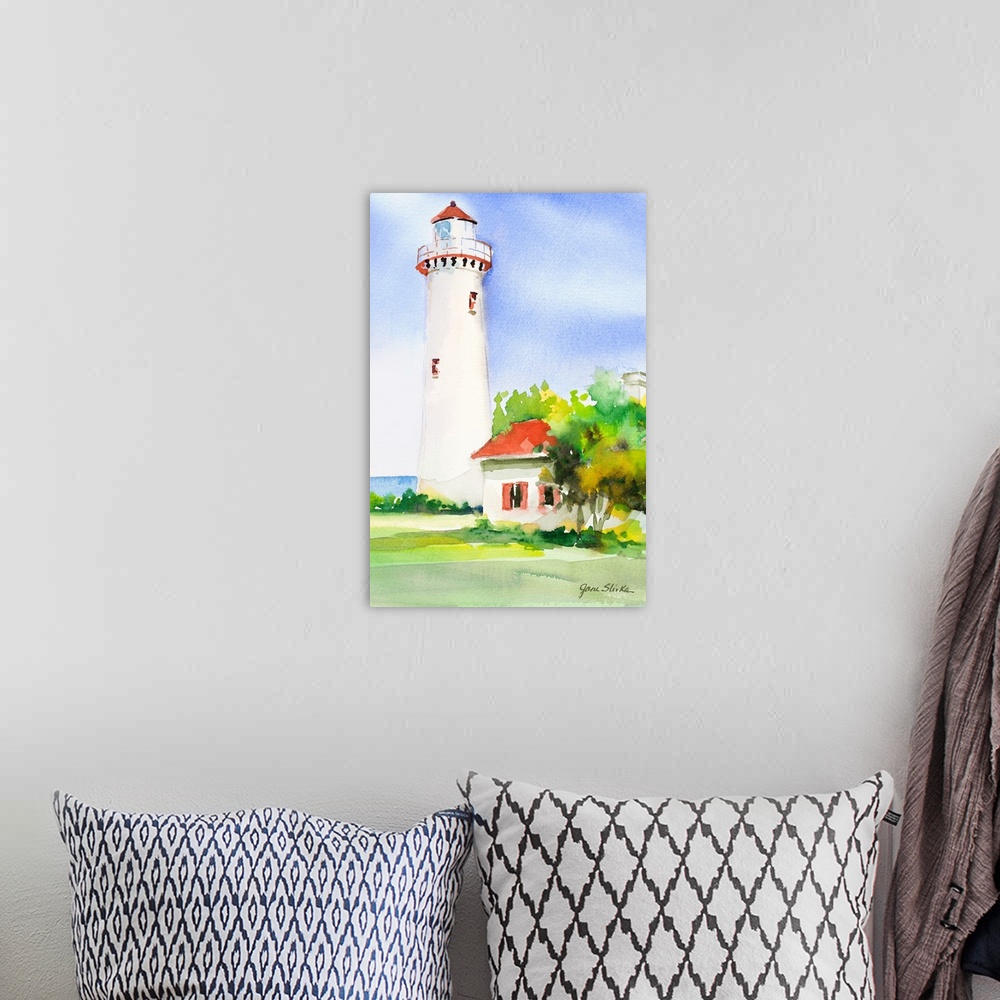 A bohemian room featuring Contemporary painting of a white lighthouse near green trees.