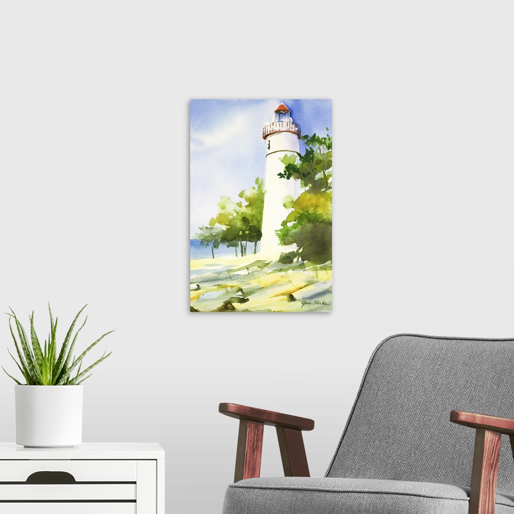 A modern room featuring Contemporary painting of a white lighthouse near green trees.