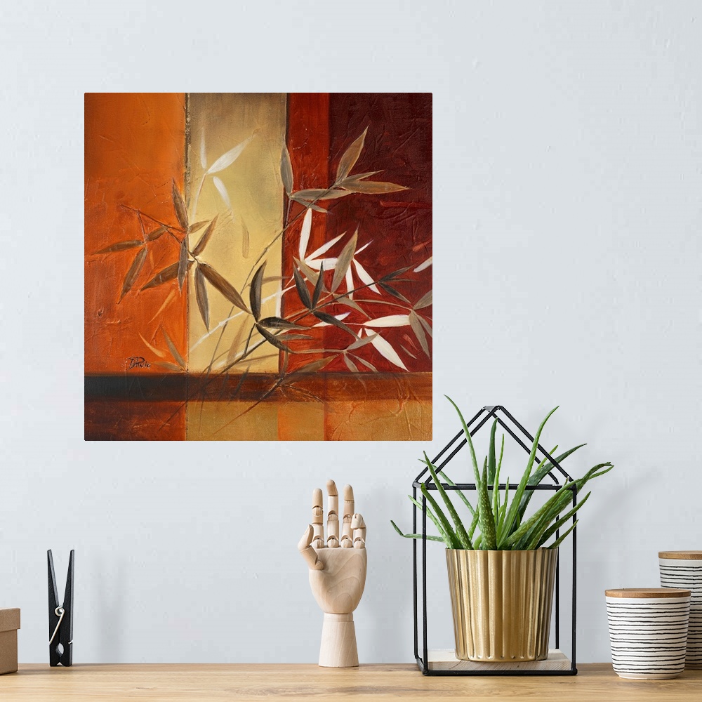 A bohemian room featuring Rust-colored painting of leaves with vertical striped background.