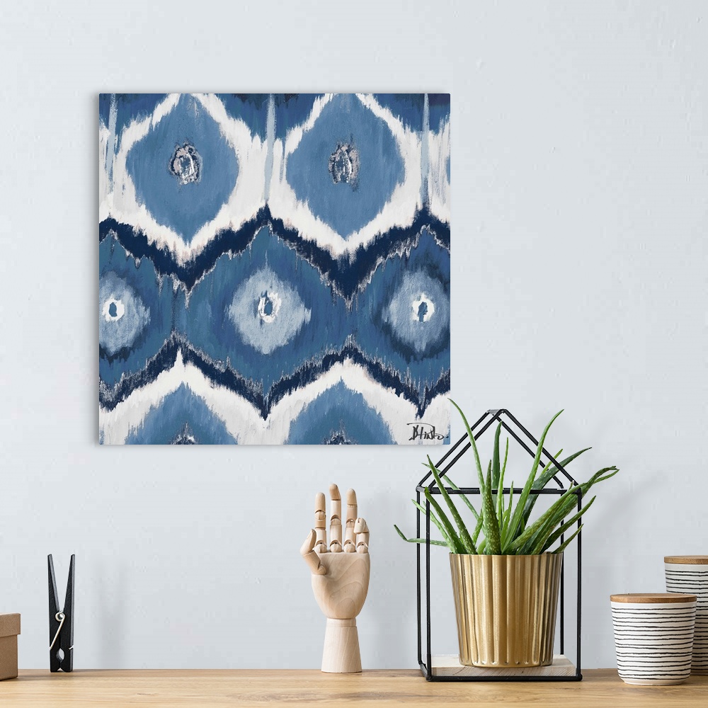 A bohemian room featuring Contemporary painting of an Ikat pattern in tones of blue and gray.