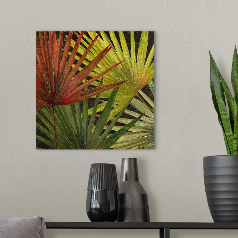 A modern room featuring Large artwork of various colored palm tree leaves that overlap each other.