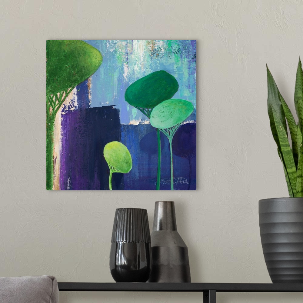 A modern room featuring A contemporary painting of abstract trees on a blue layered background.