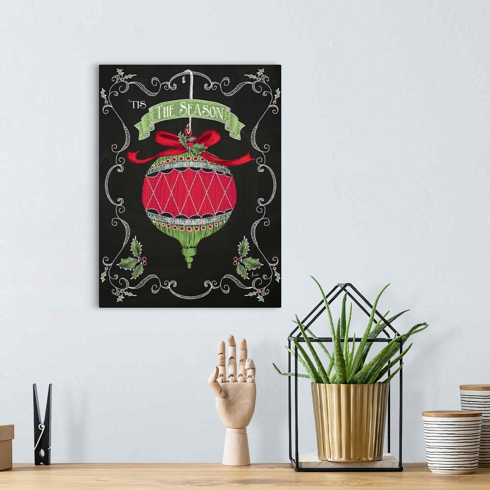 A bohemian room featuring Christmas decor artwork of a red and green ornament against a black background with white decorat...
