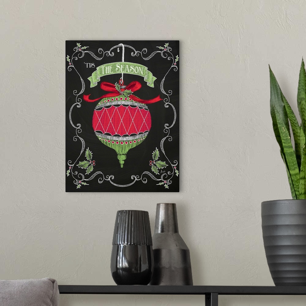 A modern room featuring Christmas decor artwork of a red and green ornament against a black background with white decorat...