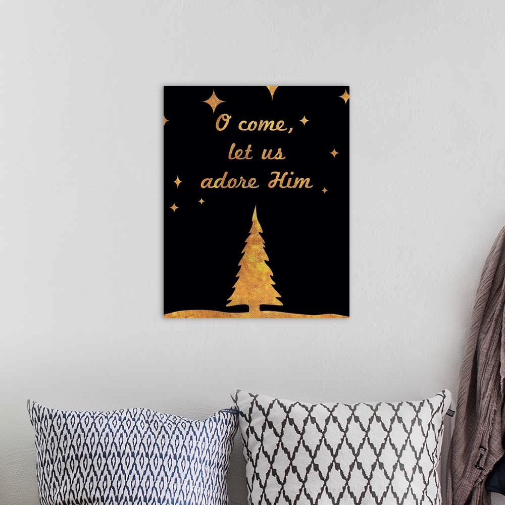 A bohemian room featuring "O Come, Let Us Adore Him" in gold and black.