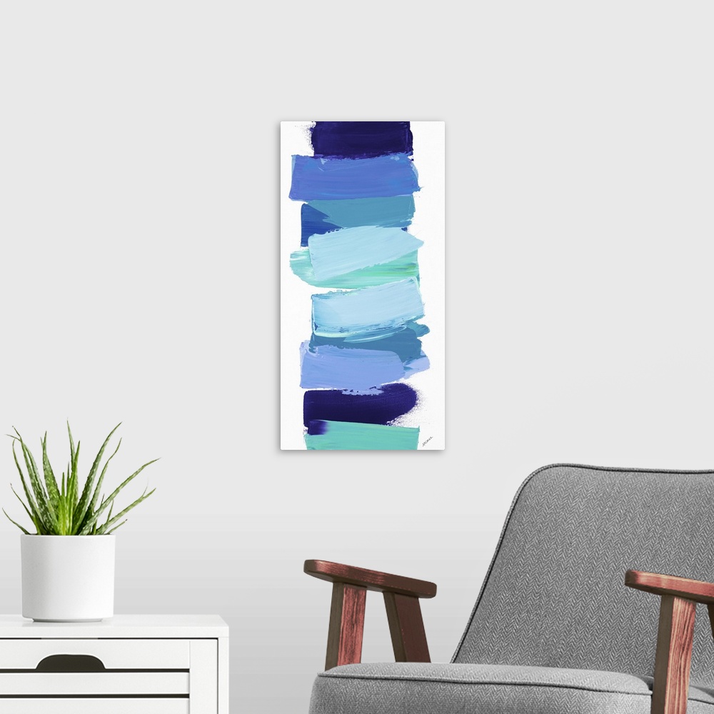 A modern room featuring Vertical contemporary painting of shades of blue stacked in a line.