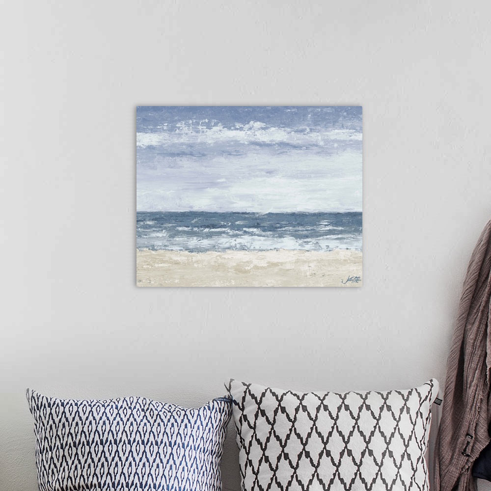 A bohemian room featuring A contemporary abstract painting of the beach with muted tones.