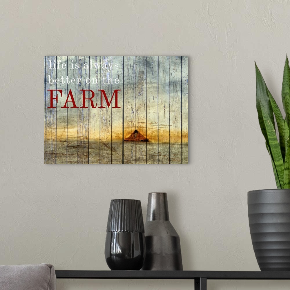A modern room featuring Painting of a farm scene with a red barn and golden horizon with the phrase "Life is always bette...