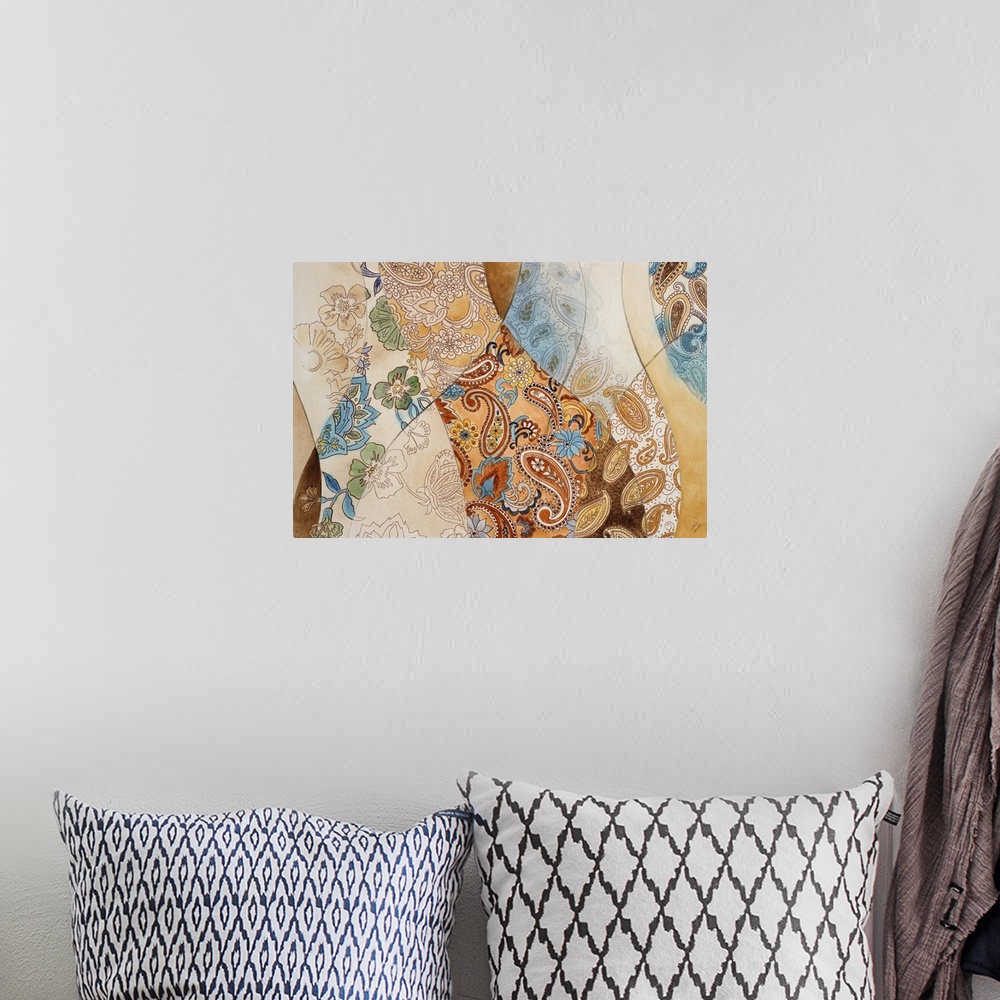 A bohemian room featuring Abstract artwork with blue and orange toned paisley patterns.
