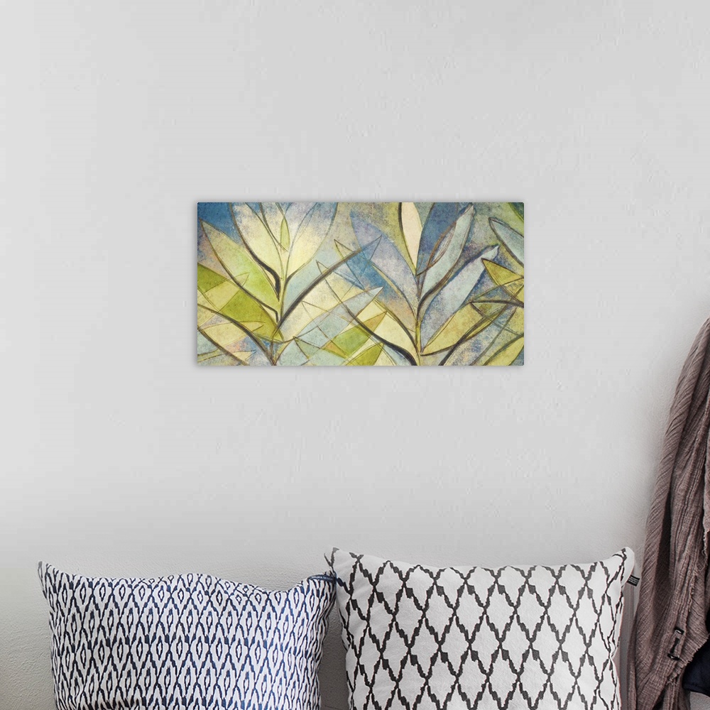 A bohemian room featuring Abstract painting of several palm leaves in varying colors intersecting.