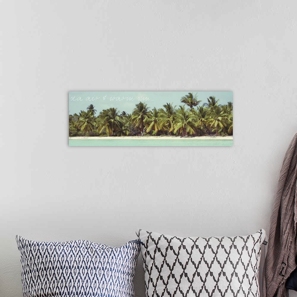 A bohemian room featuring Panoramic contemporary artwork of palm trees growing densely on the coast.