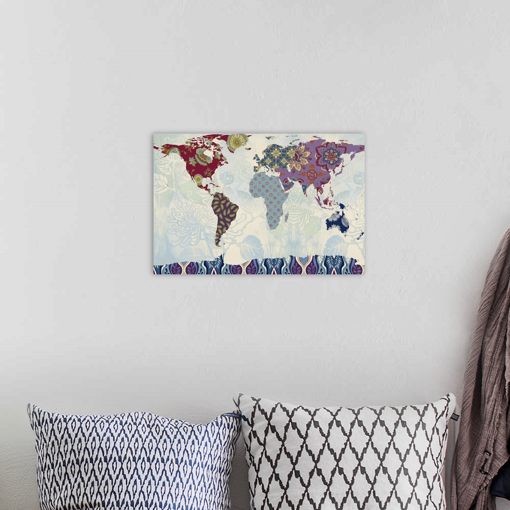 A bohemian room featuring A map of the world with the continents made of fabric patterns.