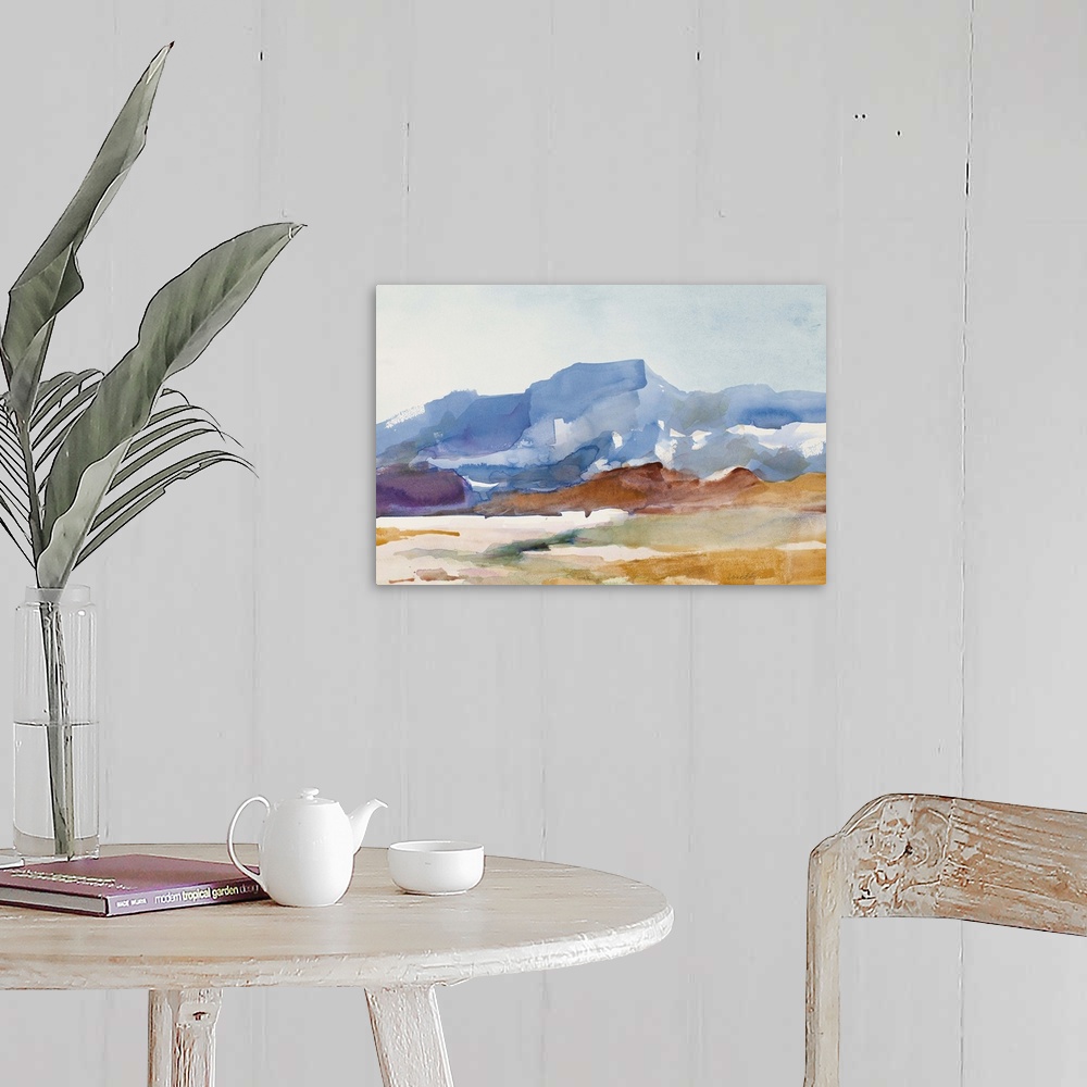 A farmhouse room featuring Watercolor landscape painting of a mountain rising over a field.
